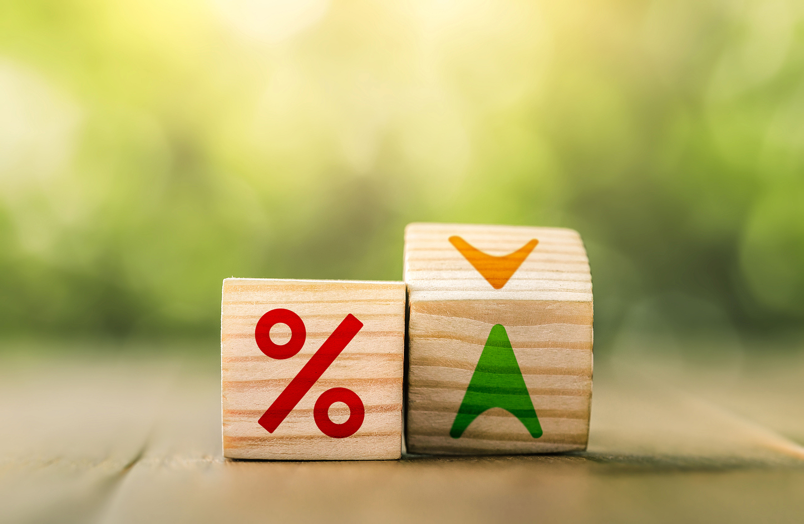 Interest rate financial and mortgage rates concept. flip wood cube change arrow down to up. Mortgage rates business, Financial interest rate and mortgage rate concept. interest rates appraisal.